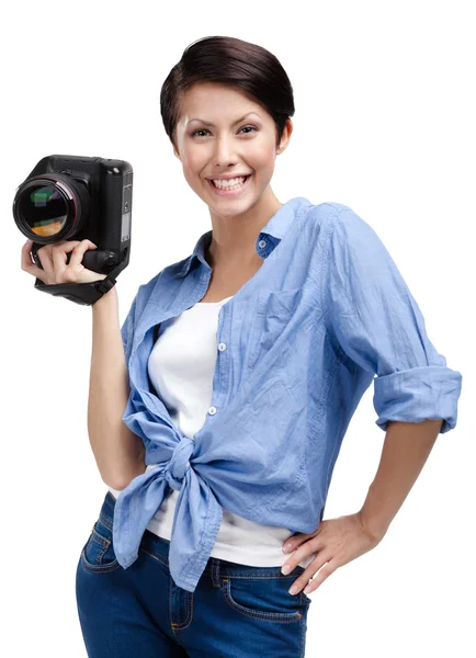 Competent woman-photographer takes snaps — Stockfoto