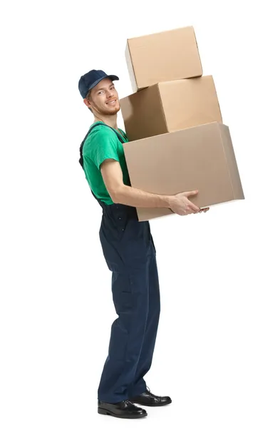 Trabalhador entrega três caixas — Fotografia de Stock