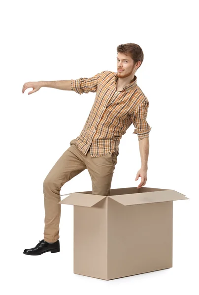 Getting out of the cardboard box — Stock Photo, Image