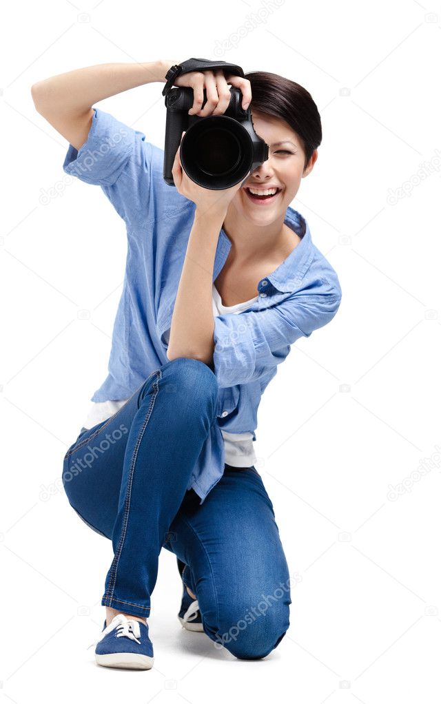 Pretty girl-photographer takes images