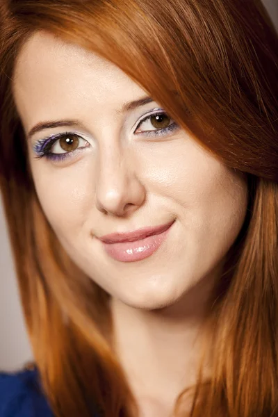 Portrait of beautiful redhead girl with style make-up. — Stock Photo, Image