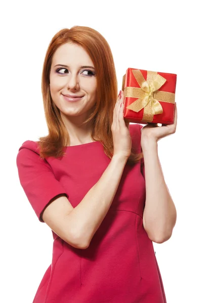 Beautiful red-haired girl with present box. — Stock Photo, Image