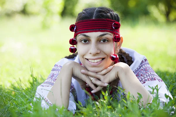 stock image Slav girl at green meadow.