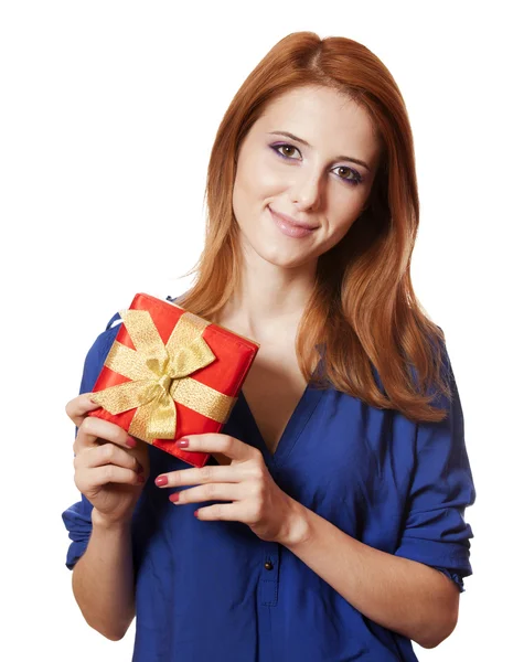 Beautiful red-haired girl with present box. — Stock Photo, Image