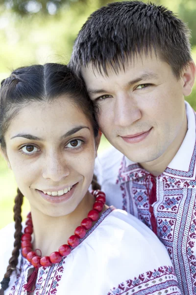 Slav girl and young cossack at nature. — Stock Photo, Image