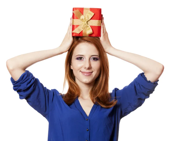 Beautiful red-haired girl with present box. — Stok fotoğraf