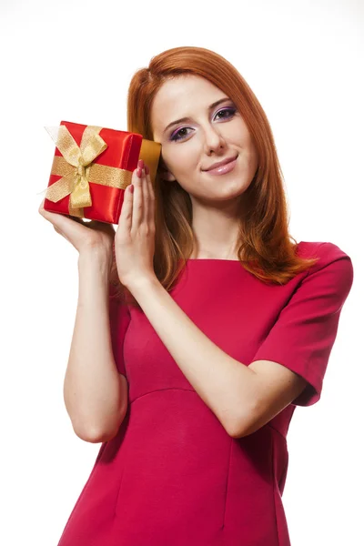 Beautiful red-haired girl with present box. — Stok fotoğraf