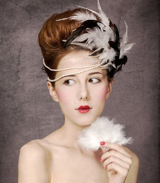 Redhead girl with Rococo hair style at vintage backgro — Stock Photo, Image