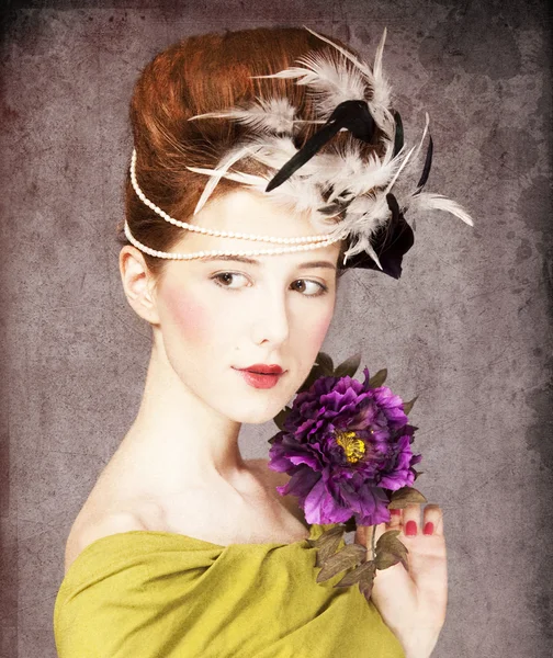 Redhead girl with Rococo hair style and flower at vintage backgr — Stock Photo, Image