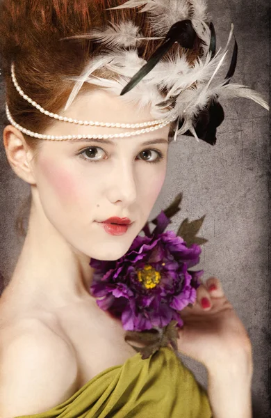 Redhead girl with Rococo hair style and flower at vintage backgr — Stock Photo, Image