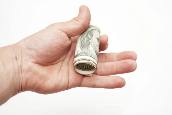 Notas de dólares em uma mão — Fotografia de Stock