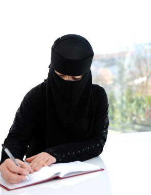 Middle eastern girl writing clipart