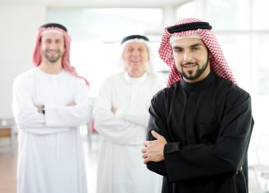 Happy Saudi man at work clipart