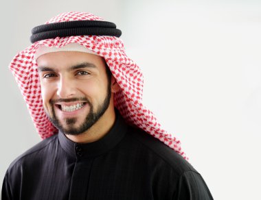 Modern arabic businessman,showing clean and healthy teath clipart