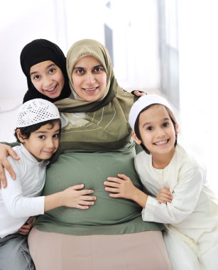Happy muslim family expecting the baby clipart