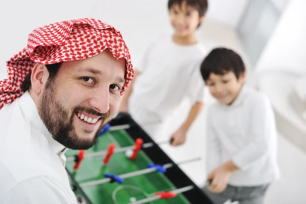 Children playing with father at home, Middle eastern family — Stock Photo, Image