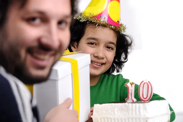 Father giving birthday present to 10 years old daughter — Stock Photo, Image