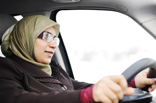 stock image Muslim woman in a car