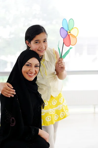 Muslim arabic mother and daughter Stock Image
