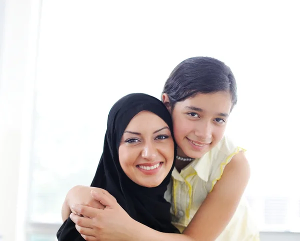 Muslim arabic mother and daughter Stock Photo