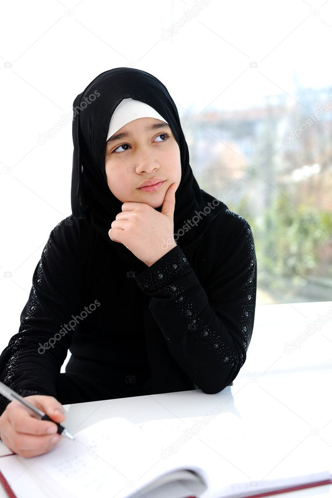 Middle eastern school girl at classroom