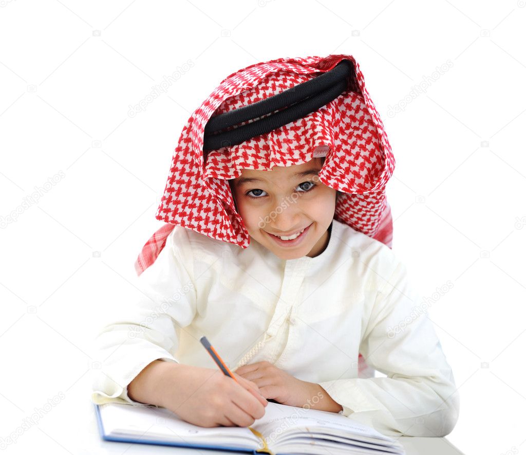 Little boy studying at school