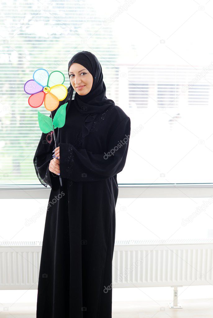 Arabic muslim woman is smiling