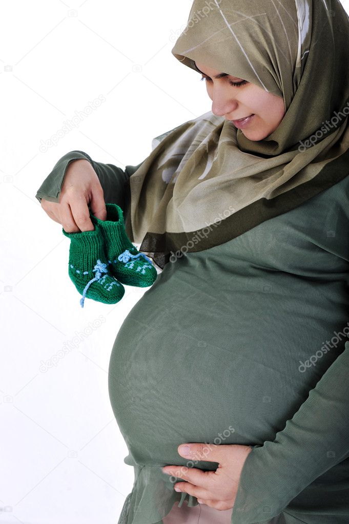 Pregnant muslim woman waiting for a desired baby