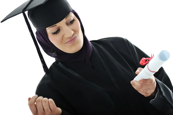 Счастливого выпускника арабского мусульманского студента с дипломом и не знаю, что делать — стоковое фото