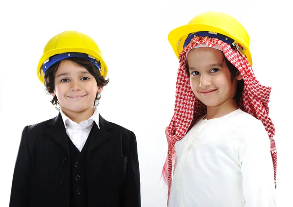 Caucasian and middle eastern little engineers — Stock Photo, Image