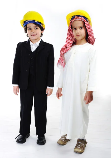Caucasian and middle eastern little engineers — Stock Photo, Image