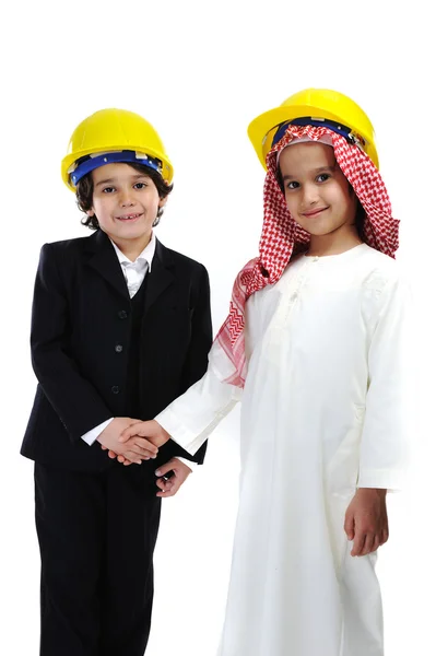 Americano e árabe muçulmanos pequenos construtores — Fotografia de Stock