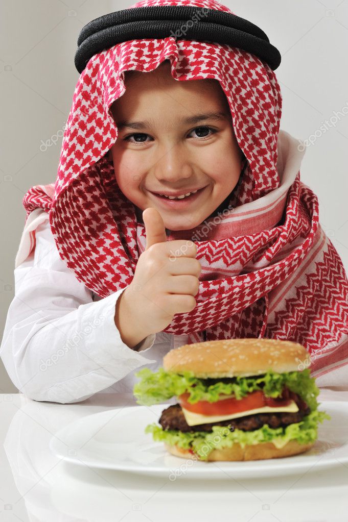 Little boy with burger