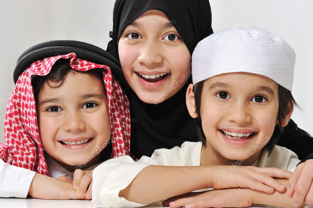 Little Muslim Arabic girl and two boys portrait