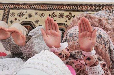 Muslim girls praying at mosque clipart