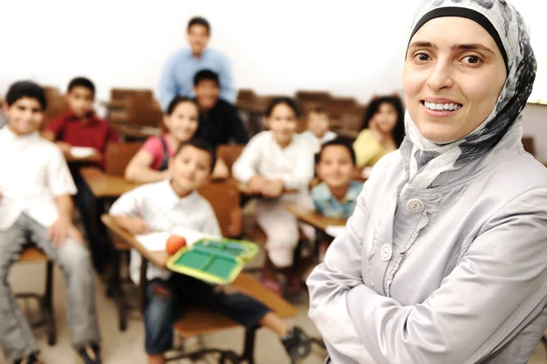 stock image Arabic kids in the school, classroom wit a teacher