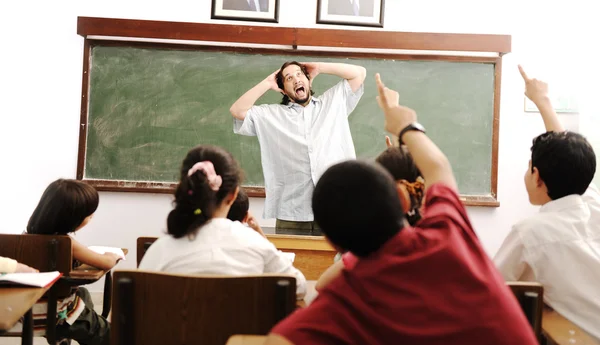 Arabic kids in the school, classroom wit a teacher