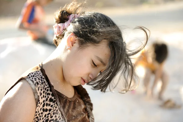 Poverty and poorness on the children face. Sad little girl. Refugee. War results. — Stock Photo, Image