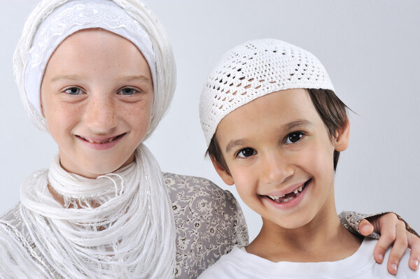 Brother and sister together, arabic muslim traditional clothes