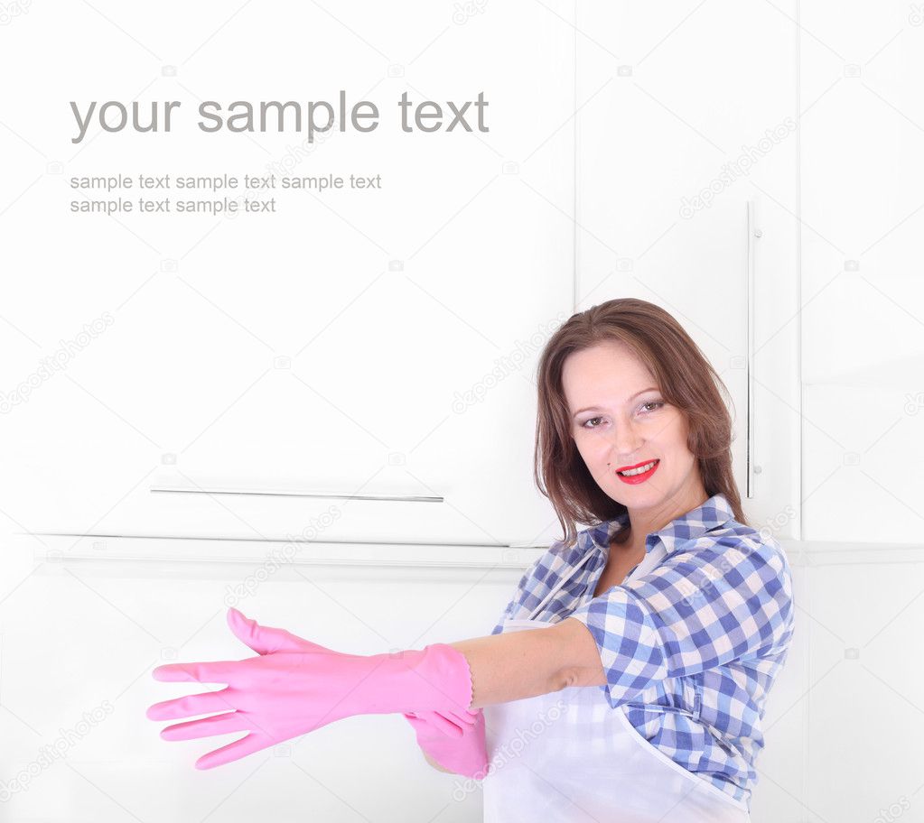 Woman homemaker with rubber gloves