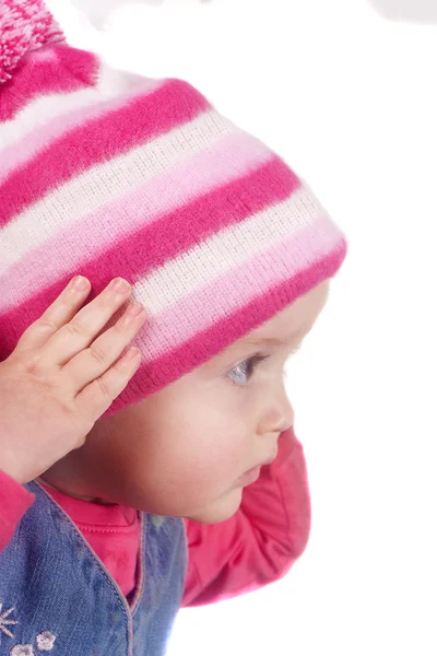 1 year old baby girl in winter bobble hat — Stock Photo, Image
