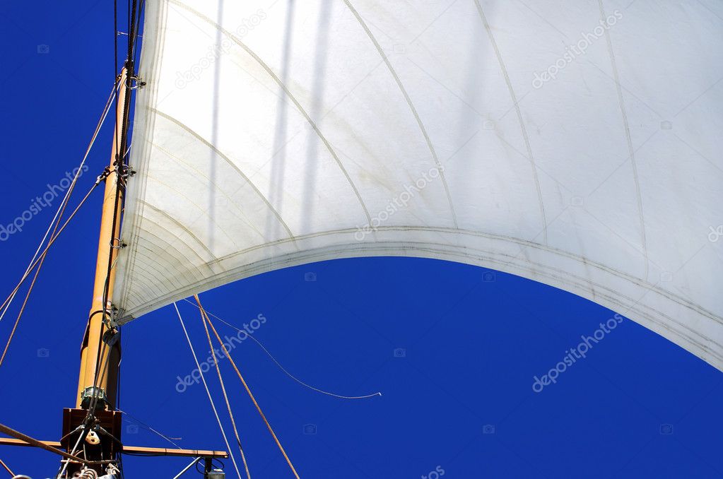 White sails of yachts and blue sky