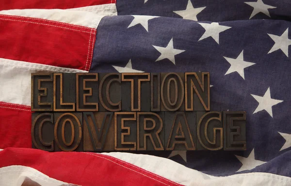 Американський прапор з висвітлення виборчої кампанії слів — стокове фото