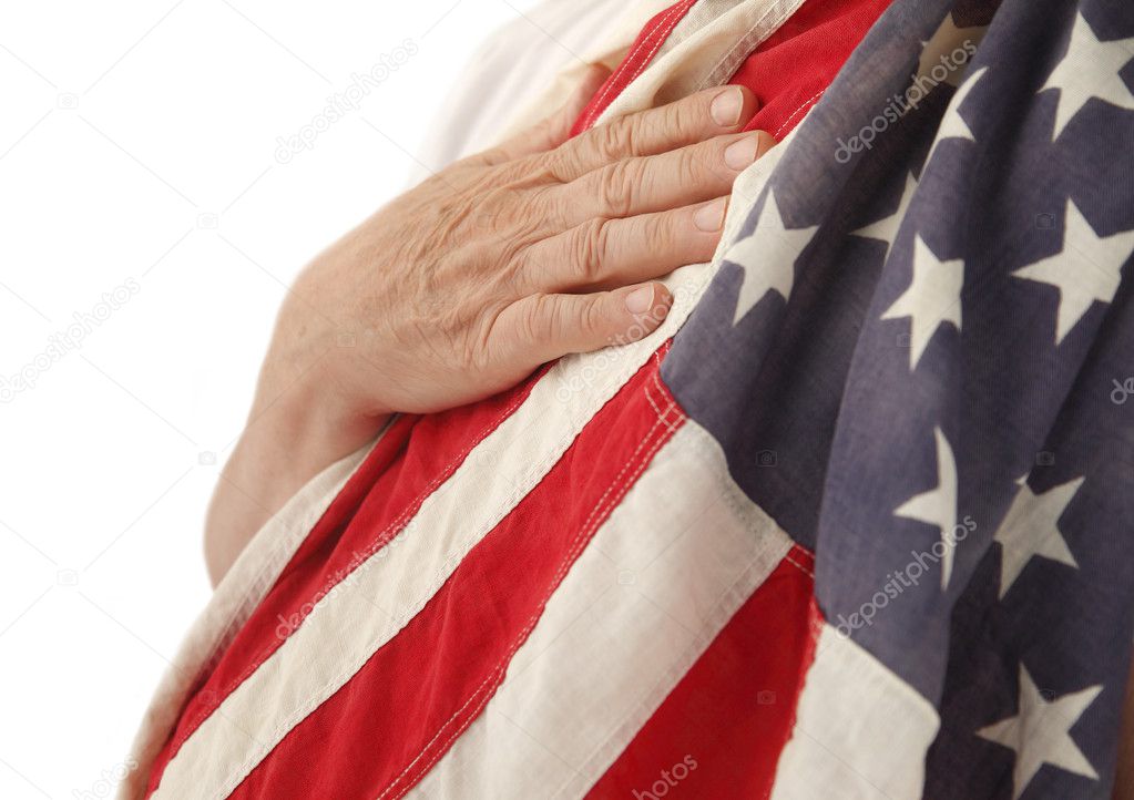 Hand on USA flag