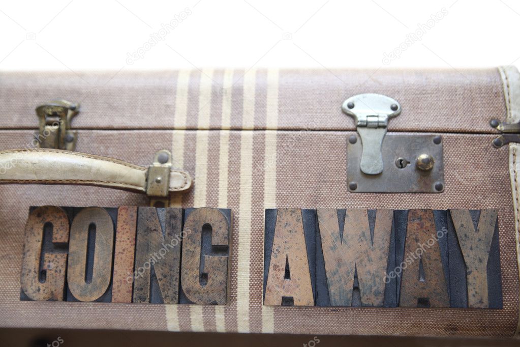 Vintage luggage with words going away