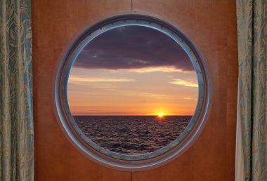 Sunrise Through Porthole clipart