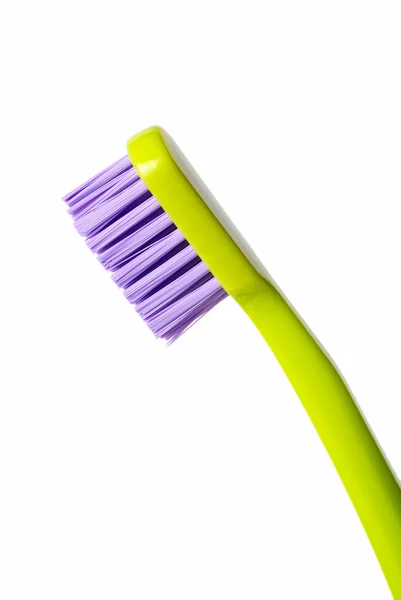 Färgade tandborste isolerad på vit bakgrund — Stockfoto