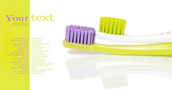 Iki renkli diş fırçaları — Stok fotoğraf