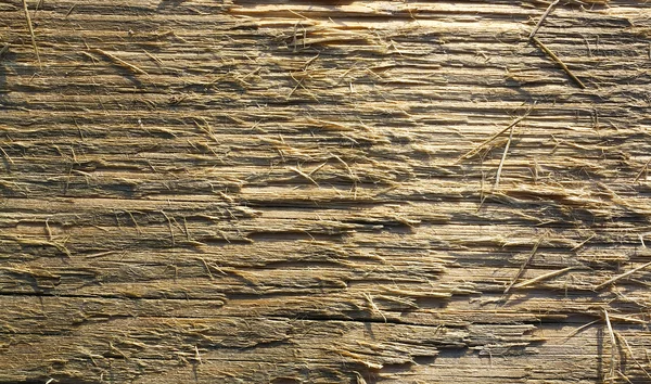 Oude verweerde houten plank bij zonsondergang. houten achtergrond — Stockfoto