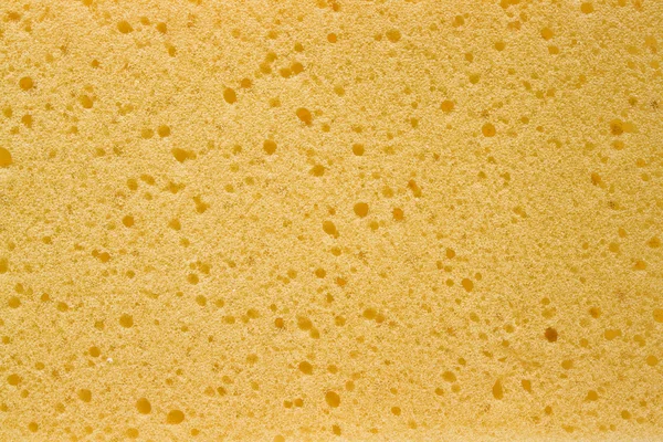 Fundo de textura de esponja amarela — Fotografia de Stock